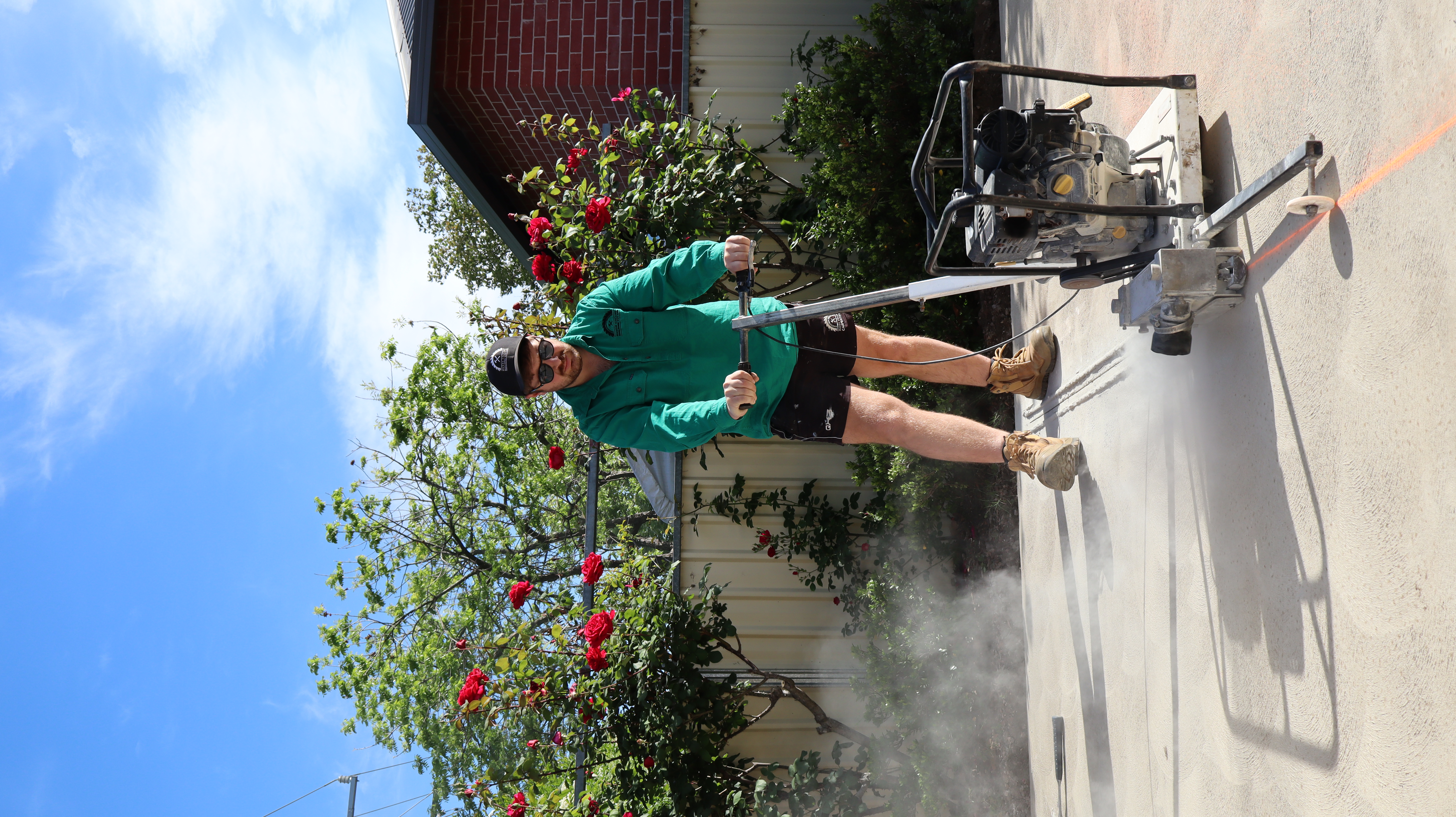 Mason Collins, founder of Mason Collins Building, working on a concrete project
